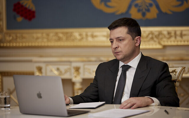 Ukrainian President Volodymyr Zelenskyy answers during an on-line interview for media in Kyiv, Ukraine,Jan. 21, 2022. (Ukrainian Presidential Press Office via AP)