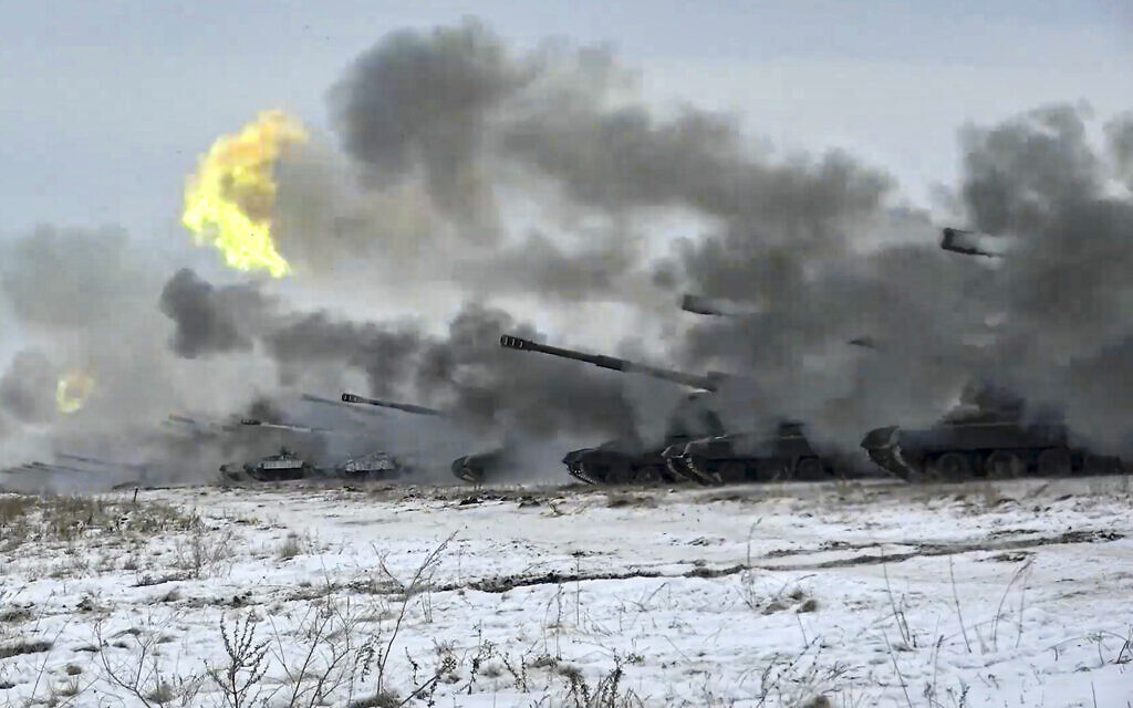 In this image taken from video and released by Russian Defense Ministry Press Service, Russian army's self-propelled howitzers fire during military drills near Orenburg in the Urals, Russia, Dec. 16, 2021 (Russian Defense Ministry Press Service via AP, File)