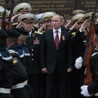Russian President Vladimir Putin attends a parade marking the Victory Day in Sevastopol, Crimea, on May 9, 2014. (AP Photo/Ivan Sekretarev, File)