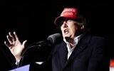 Former President Donald Trump speaks at a rally on Jan. 15, 2022, in Florence, Ariz. Trump is already declaring himself the 45th and 47th president of the United States. But the quip during a round of golf — captured on shaky cellphone video — belies the growing challenges Trump is confronting. (AP/Ross D. Franklin, File)
