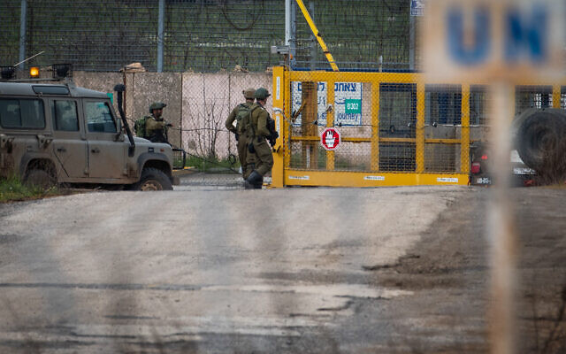 Israeli soldiers guard the Quneitra Crossing, on the Israeli-Syrian border, in the Golan Heights on March 23, 2019. (Basel Awidat/Flash90)