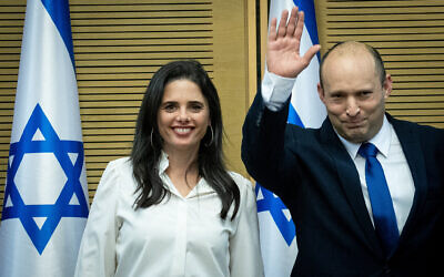 Then-prime minister Naftali Bennett, right, with Ayelet Shaked at the first government conference, at the Israeli parliament, on June 13, 2021. (Yonatan Sindel/ Flash90)