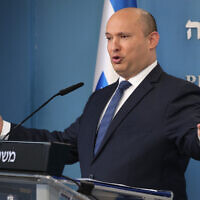 Prime Minister Naftali Bennett speaks during a press conference at the Prime Minister's Office in Jerusalem on January 2, 2022. (Emil Salman/Pool/Flash90)