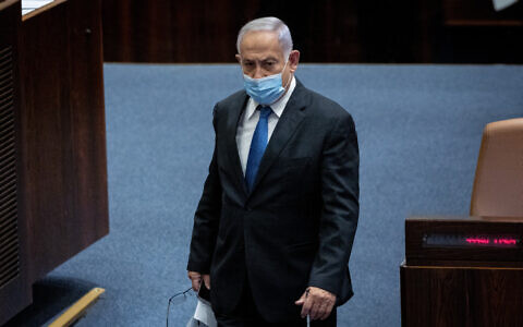 Opposition leader Benjamin Netanyahu seen at the Knesset in Jerusalem, January 5, 2022 (Yonatan Sindel/Flash90)