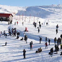 People at the Mount Hermon ski resort in northern Israel, January 17, 2022. (David Cohen/Flash90)