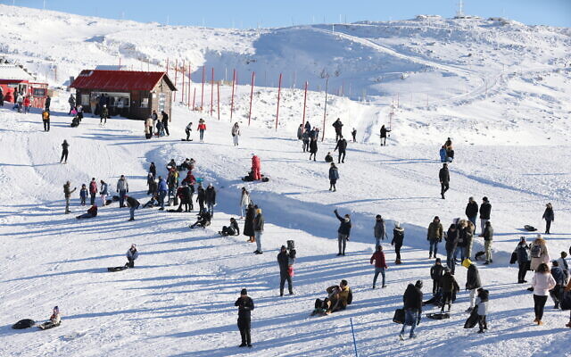 People at the Mount Hermon ski resort in northern Israel, January 17, 2022. (David Cohen/Flash90)