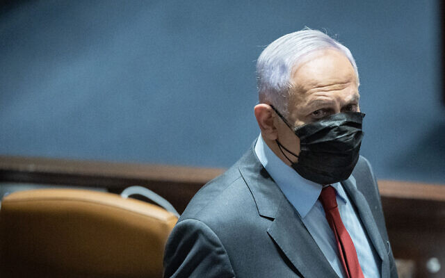 Opposition leader MK Benjamin Netanyahu attends a plenum session in the assembly hall of the Knesset, in Jerusalem on January 19, 2022. (Yonatan Sindel/Flash90)