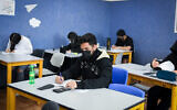 High school students take a mathematics exam in a school in Yehud, on January 20, 2022. (Yossi Zeliger/Flash90)