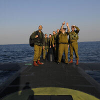 IDF troops, including then chief of staff Benny Gantz, stand on a Dolphin-class submarine (IDF via Wikipedia)