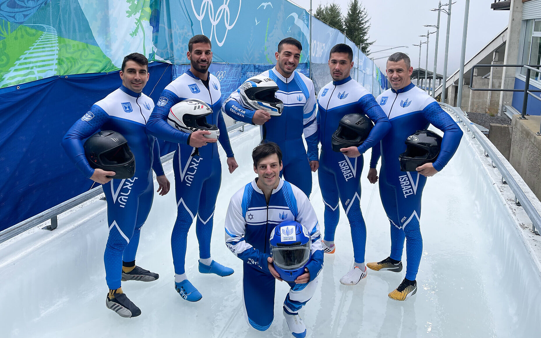 AJ Edelman (front) poses for a photo with the rest of the Israel Bobsled team (from left): Amitay Tzemach, Ward Fawarsy, Menachem Chen, Roman Shargaev and Amit Haas. (Courtesy AJ Edelman)