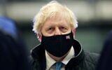 Britain's Prime Minister Boris Johnson during a visit to Anglesey, North Wales, January 27, 2022. (Carl Recine/Pool Photo via AP)