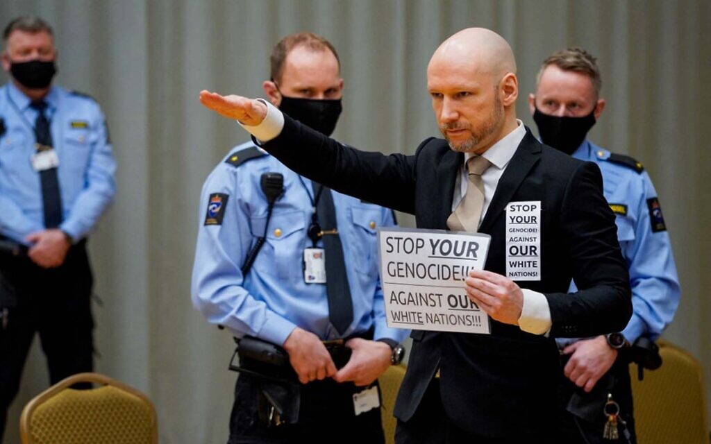 Norway extremist makes Nazi salute as he seeks parole just 10 years after killing 77