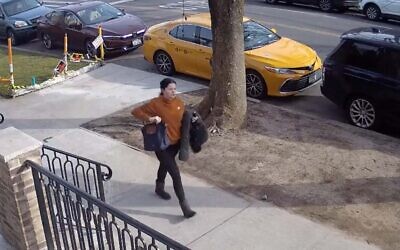 A woman who allegedly spit on Jewish children in New York seen in security camera footage from January 14, 2022. (Screenshot/NYPD)