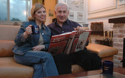 File -- Likud party leader Benjamin Netanyahu poses with his wife Sara in their Jerusalem home on Saturday, 25 march 2006.( Yossi Zamir/Flash90)