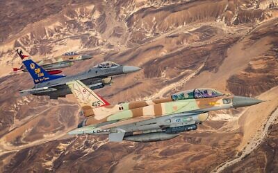 Two Israeli and one American F-16 fighter jets fly alongside one another during a joint exercise in southern Israel in January 2022. (Israel Defense Forces)
