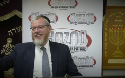 Rabbi YY Rubinstein speaks at a charity in New York City, Aug, 5, 2019. (Chazaq/YouTube via JTA)