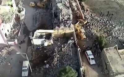 Ruins of a prison hit by a Saudi-led coalition airstrike in Saada, Yemen, January 21, 2022 (Screen grab/BBC)