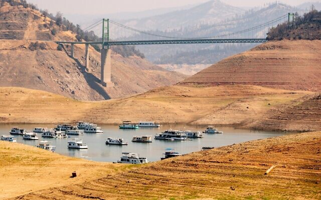 In this file photo taken on September 06, 2021, houseboats sit in a narrow section of water in a depleted Lake Oroville in Oroville, California. (JOSH EDELSON / AFP)
