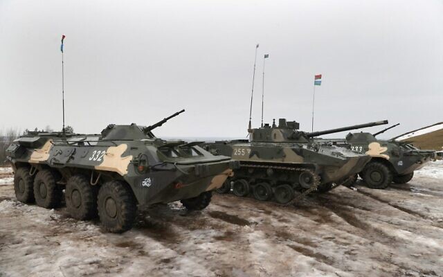 A photograph taken on February 17, 2022 shows Belarus' armored personnel carrier (APC) during joint exercises of the armed forces of Russia and Belarus as part of an inspection of the Union State's Response Force, at a firing range near a town of Osipovichi outside Minsk. (Maxim GUCHEK / BELTA / AFP)