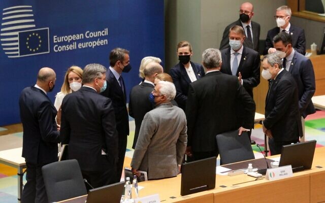 EU leaders talk prior to a round table during an emergency European Union (EU) summit at The European Council Building in Brussels, on February 24, 2022, on the situation in Ukraine after Russia launched an invasion. (Olivier Hoslet/Pool/AFP)