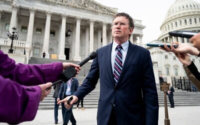 Rep. Thomas Massie, Republican-Kentucky, stops to speak with reporters as he leaves the Capitol, March 27, 2020. (Bill Clark/CQ-Roll Call, Inc via Getty Images/JTA)