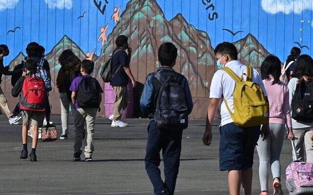 Illustrative: Students walk to their classrooms at a public middle school in Los Angeles, California, Sept. 10, 2021. (Robyn Beck/AFP/Getty Images via JTA)