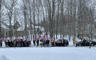 A group of men protest outside of Rep. Casey Weinstein’s home. (Courtesy: Cleveland Jewish News/via JTA)
