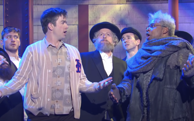 John Mulaney and Kenan Thompson perform a parody of 'Fiddler on the Roof' with a chorus line of Hasidic dancers on 'Saturday Night Live,' on February 26, 2022. (NBC/YouTube via JTA)