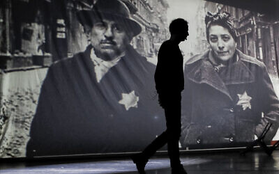 An actor of the Romania's Jewish State Theatre rehearses the musical drama 'The Lights of the Ghetto,' a mix of music and stories by Holocaust survivors in Bucharest, Romania, January 26, 2019.  (AP Photo/ Vadim Ghirda, File)