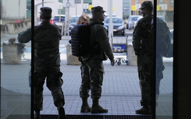 US Army officers after arrival at the Rzeszow-Jasionka airport in southeastern Poland, on February 5, 2022. (AP Photo/Czarek Sokolowski)