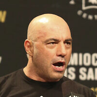 Joe Rogan is seen during a weigh-in before UFC 211 on May 12, 2017, in Dallas before UFC 211. ( AP Photo/Gregory Payan, File)