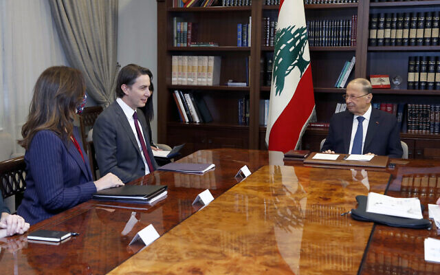 In this photo released by Lebanese government, Lebanese President Michel Aoun, right, meets with US Envoy for Energy Affairs Amos Hochstein, center, and US Ambassador to Lebanon Dorothy Shea, left, at the presidential palace in Baabda, east of Beirut, Lebanon, February 9, 2022. (Dalati Nohra/Lebanese Official Government via AP)