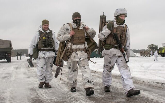 Ukrainian soldiers train during military drills close to Kharkiv, Ukraine, on February 10, 2022. (AP Photo/Andrew Marienko)