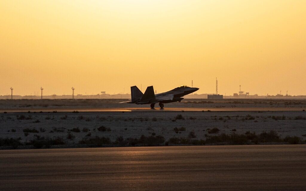 In this photo released by the US Air Force, a US Air Force F-22 Raptor arrives at Al-Dhafra Air Base in Abu Dhabi, United Arab Emirates, February 12, 2022. (Tech Sgt. Chelsea E. FitzPatrick/U.S. Air Force via AP)