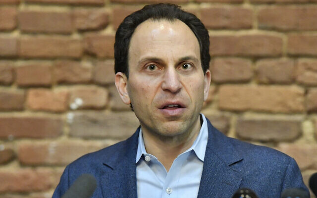Louisville Democratic mayoral candidate Craig Greenberg speaks during a news conference in Louisville, Ky., Monday, Feb. 14, 2022. Greenberg was shot at Monday morning at a campaign office but was not struck, though a bullet grazed a piece of his clothing, police said. (AP Photo/Timothy D. Easley)
