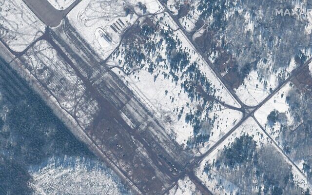 This February 15, 2022 satellite image provided by Maxar Technologies shows an area where troops and equipment departed from Zyabrovka airfield in Belarus. (Satellite image ©2022 Maxar Technologies via AP)