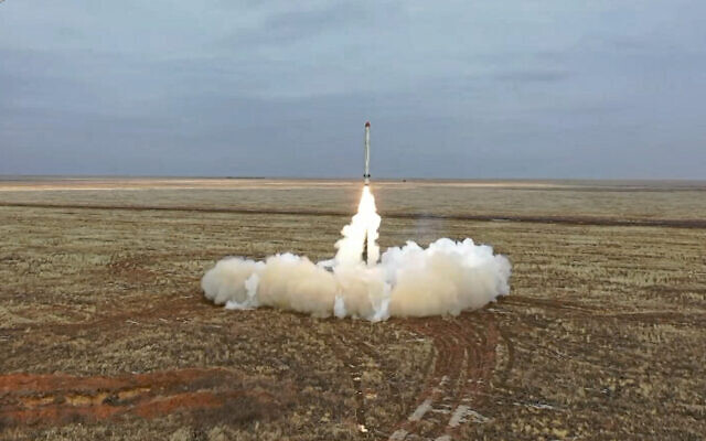 This photo taken from video provided by the Russian Defense Ministry Press Service on Saturday, Feb. 19, 2022, shows a Russian Iskander-K missile launched during a military exercise at a training ground in Russia. (Russian Defense Ministry Press Service via AP)