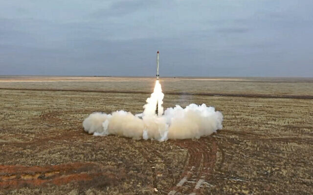 This photo, taken from video provided by the Russian Defense Ministry Press Service on February 19, 2022, shows a Russian Iskander-K missile launched during a military exercise at a training ground in Russia. (Russian Defense Ministry Press Service via AP)