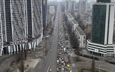 Traffic jams are seen as people leave the city of Kyiv, Ukraine, Thursday, Feb. 24, 2022 (AP Photo/Emilio Morenatti)