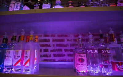 An empty space on a liquor shelf where Russian vodka used to be located at The Sidetrack, a gay bar on the north side of Chicago, July 29, 2013. (AP Photo/Scott Eisen)