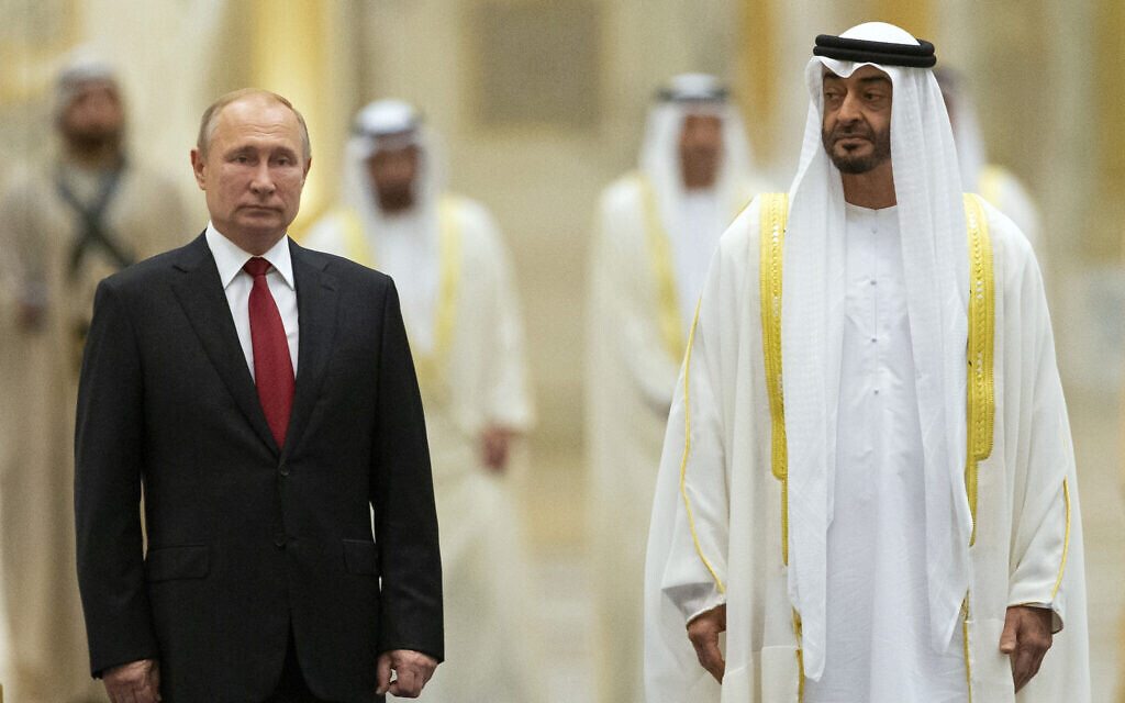 Russian President Vladimir Putin, left, and Abu Dhabi Crown Prince Mohamed bin Zayed al-Nahyan attend the official welcome ceremony in Abu Dhabi, United Arab Emirates, October 15, 2019. (AP Photo/Alexander Zemlianichenko, File)