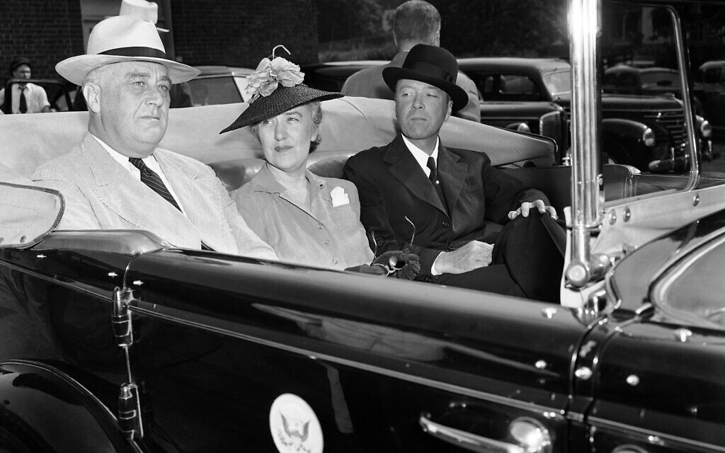 President Franklin D. Roosevelt, his secretary Marguerite Lehand and ambassador to France William C. Bullitt ride from the railroad station to FDR's Hyde Park, New York, home on July, 22, 1940, after a trip to Washington. (AP Photo)