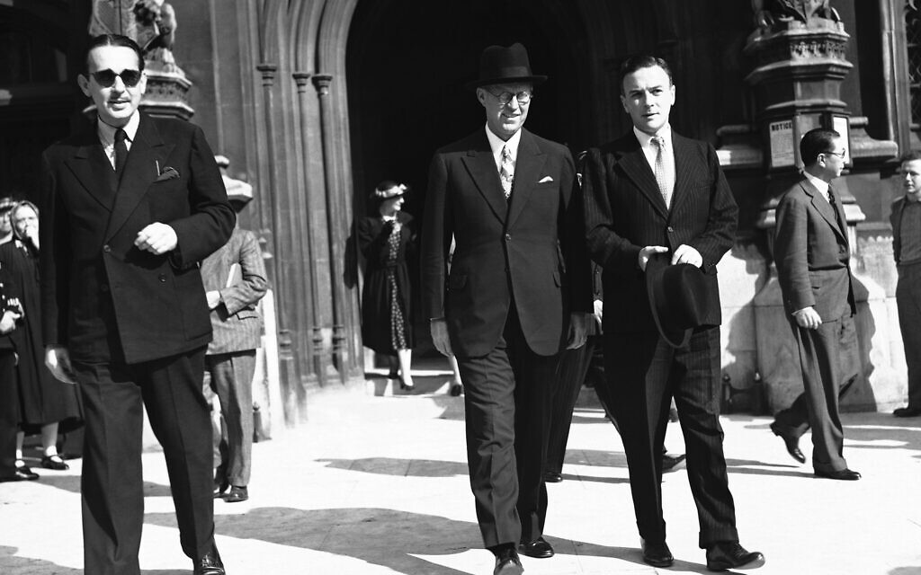 Joseph Patrick Kennedy, known as Joe Kennedy, the American Ambassador in London smiling as he leaves the House of Commons, London on August 29, 1939, after being present at the special sitting of the house. (AP Photo/Staff/Len Puttnam)