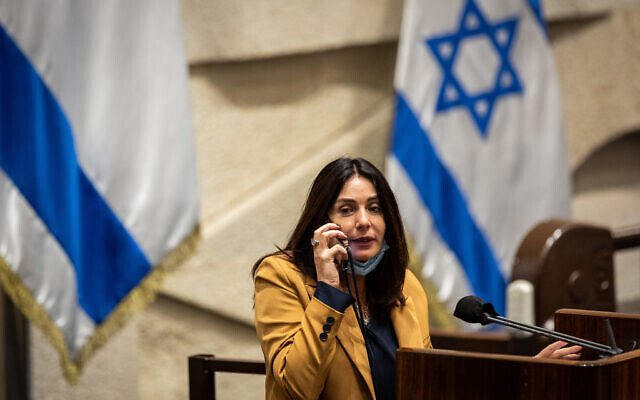 MK Miri Regev holds a phone to her ear in the Knesset in Jerusalem, on February 7, 2022 (Yonatan Sindel/Flash90)