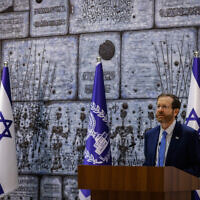 President Isaac Herzog speaks during a ceremony announcing the winners of the Wolf Foundation award, at the President's Residence in Jerusalem on February 8, 2022. (Olivier Fitoussi/Flash90)