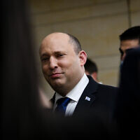 Prime Minister Naftali Bennett leaves his Knesset office, February 21, 2022. (Arie Leib Abrams/Flash90