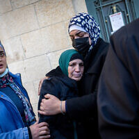 Family members of Iyad Halak, a 32-year-old autistic Palestinian who was shot and killed in the Old City of Jerusalem, seen after a court hearing of the border police officer who accused of shooting and killing of Iyad, at the District court in Jerusalem, February 27, 2022. Photo by Yonatan Sindel/Flash90