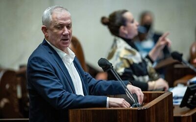 Defense Minister Benny Gantz speaks during a Knesset discussion on the military pension law, on February 28, 2022. (Yonatan Sindel/Flash90)