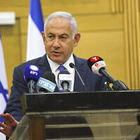 Likud leader Benjamin Netanyahu speaks at his party's faction meeting in the Knesset, February 28, 2022. (Yonatan Sindel/Flash90)