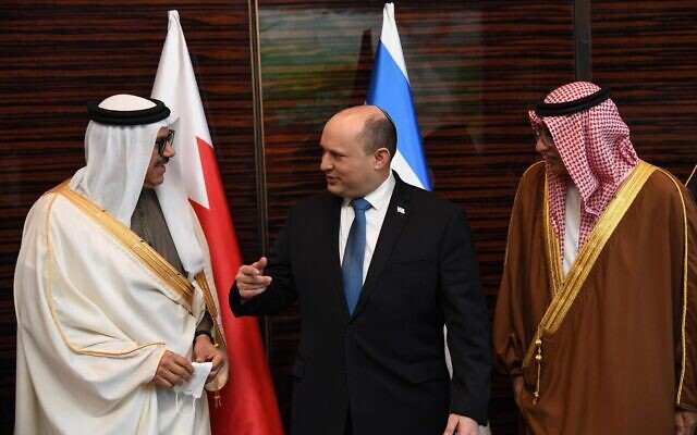 Prime Minister Naftali Bennett meets with Bahraini ministers in Manama, on February 15, 2022. (Haim Zach/GPO)